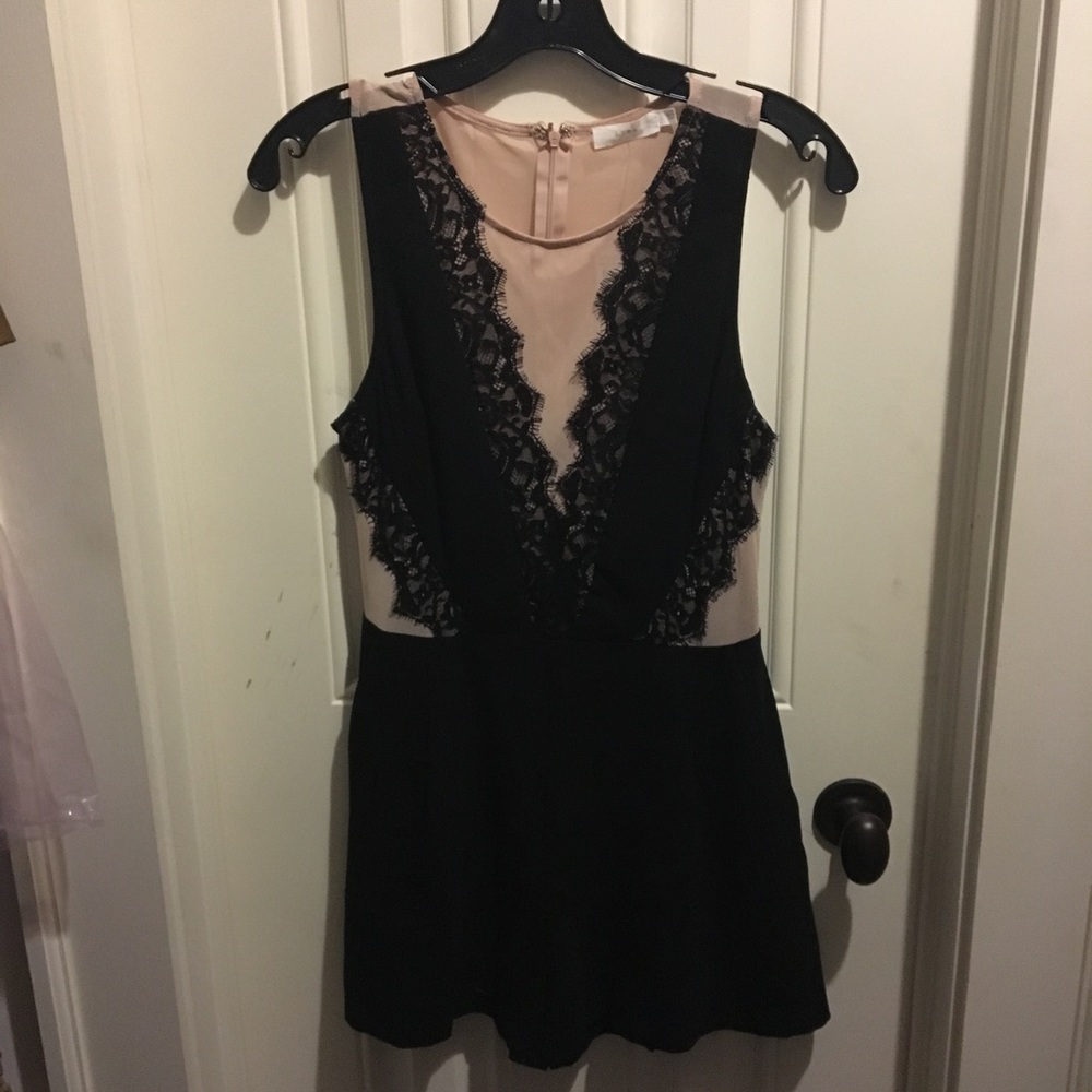 Black lace and nude romper